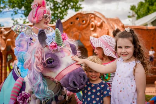 Cereamic Mural - children with Dolly the Unicorn